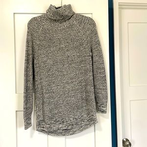 Black and white turtleneck sweater